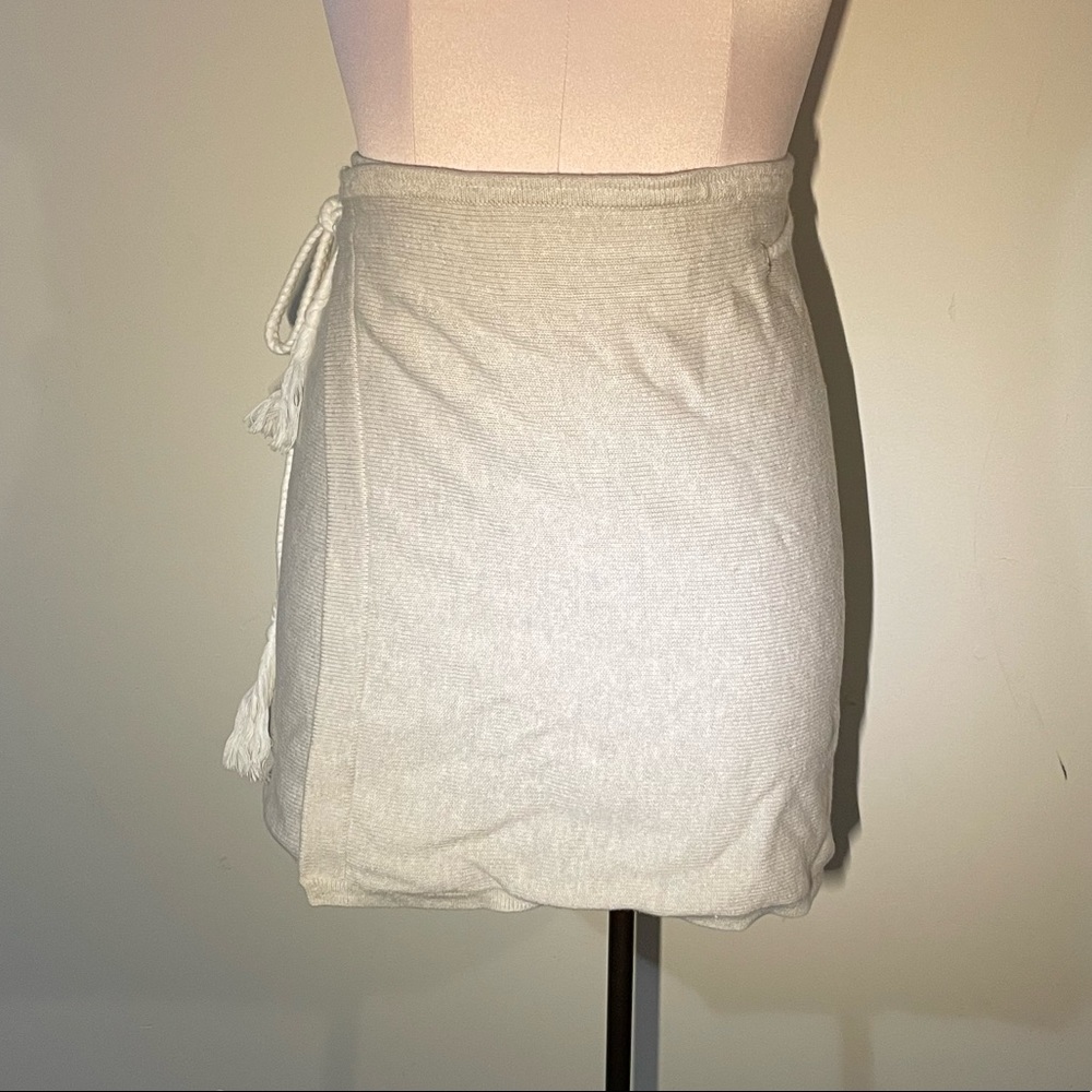 Wraparound knit mini skirt